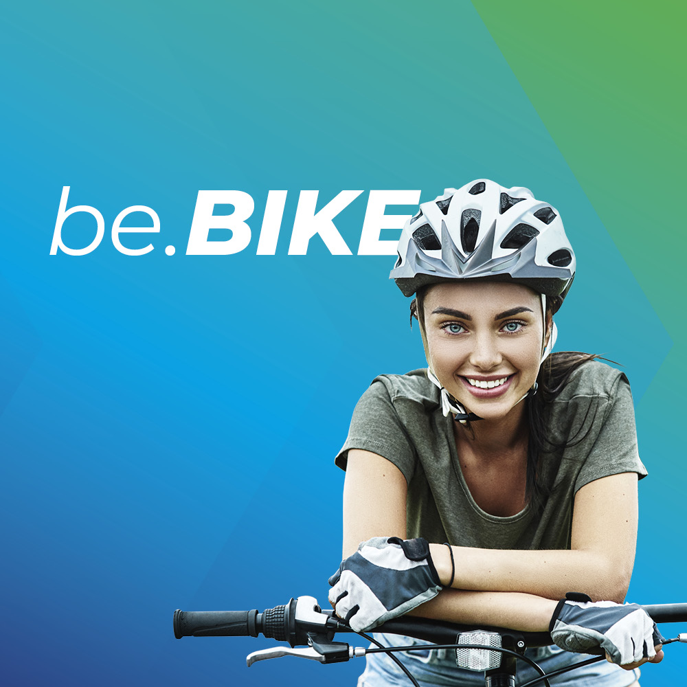 Slider be.Bike groß mobil mit Frau auf Fahrrad